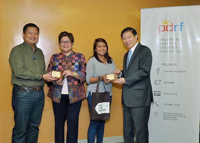 Standing from left: DJ Sta. Ana, first VP for Government Relations of Aboitiz Equity Ventures; Marilou Erni, PDRF executive director; Risiella Arcena, Territory Business Manager of Pilmico Foods Corp. (maker of high-energy biscuits); and Rene Meily, PDRF president. (CONTRIBUTED PHOTO). 