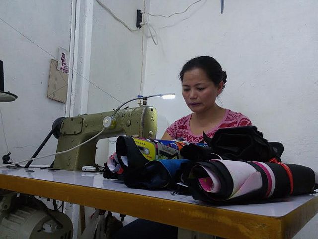 Abegail Cabanit says she makes from 500 to 1,000 pieces of various bags each month. (CDN PHOTO/VICTOR ANTHONY V. SILVA)