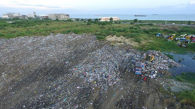 Cebu City’s transfer station for the city’s trash is getting swamped with more garbage daily until city officials can enter into a contract with a private hauler that would dump the garbage in an authorized landfill.  (CDN DRONE PHOTO/TONEE DESPOJO). 