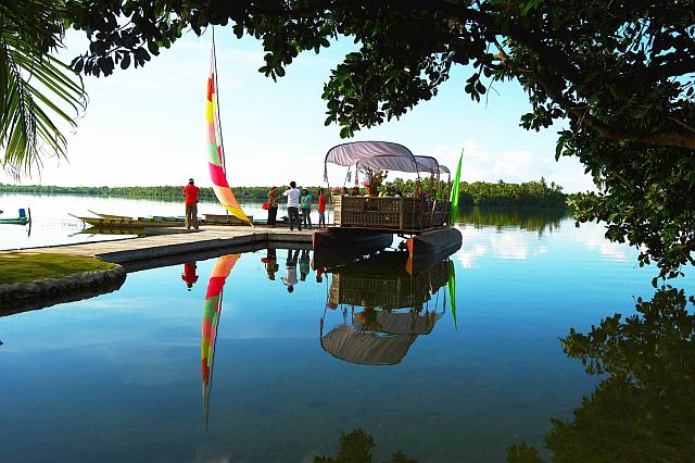 Tourists experience the breathtaking view of Lake Danao in the town of San Francisco, one of the prime tourism destinations on Camotes Islands located along the northern section of Cebu province. (CDN FILE PHOTO)