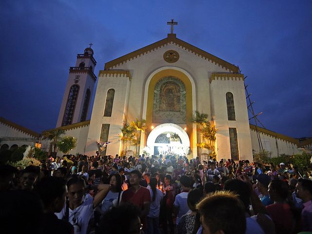  Thousands of devotees join the annual solemn procession of Our Lady of Guadalupe as part of its fiesta celebration (CDN PHOTO/LITO TECSON). 