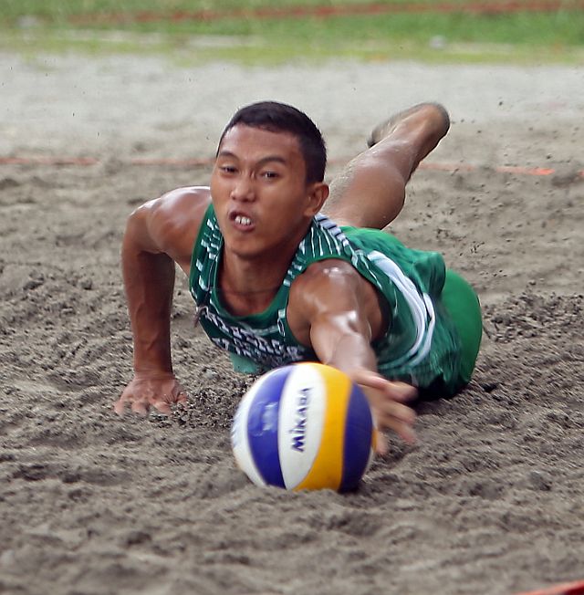 Jojo Noval of the University of the Visayas (UV) fails to save the ball but he and his partner John Juban managed to save their game against the Southwestern University (SWU) in the Cesafi men’s beach volleyball match at the Aznar San Courts. UV won the match to advance to the semifinal round.  (CDN PHOTO/LITO TECSON)
