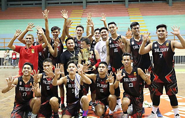 Members of the Talisay City team celebrate their title win with the tournament’s namesake, First District Representative Gerald Anthony Gullas (fourth from right, standing). (CONTRIBUTED). 