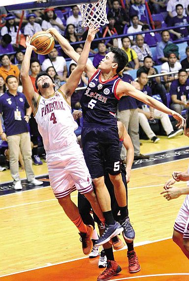 Letran’s Jomari Sollano in action during a NCAA game earlier this year. Sollano, a former USPF center, was picked by Tanduay in the first round. (FILE PHOTO)