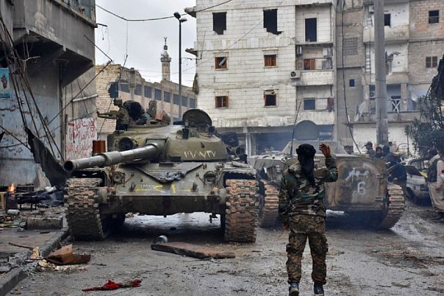 Syrian government forces patrol the northern city of Aleppo. (AFP)