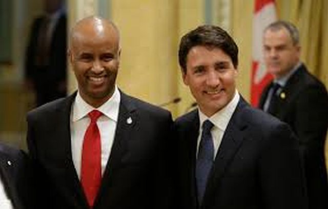 Immigration Minister Ahmed Hussen and Prime Minister Justin Trudeau. File photo