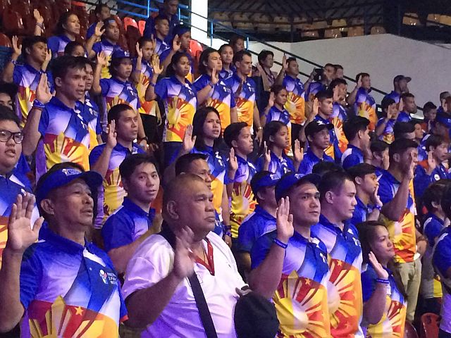 Some of the members of the Philippine Team take part in the Oath of Support during the launching of the Philippine Sports Institute at the PSC Multi-Sports Arena in Pasig City. (CDN PHOTO/ CALVIN CORDOVA) 