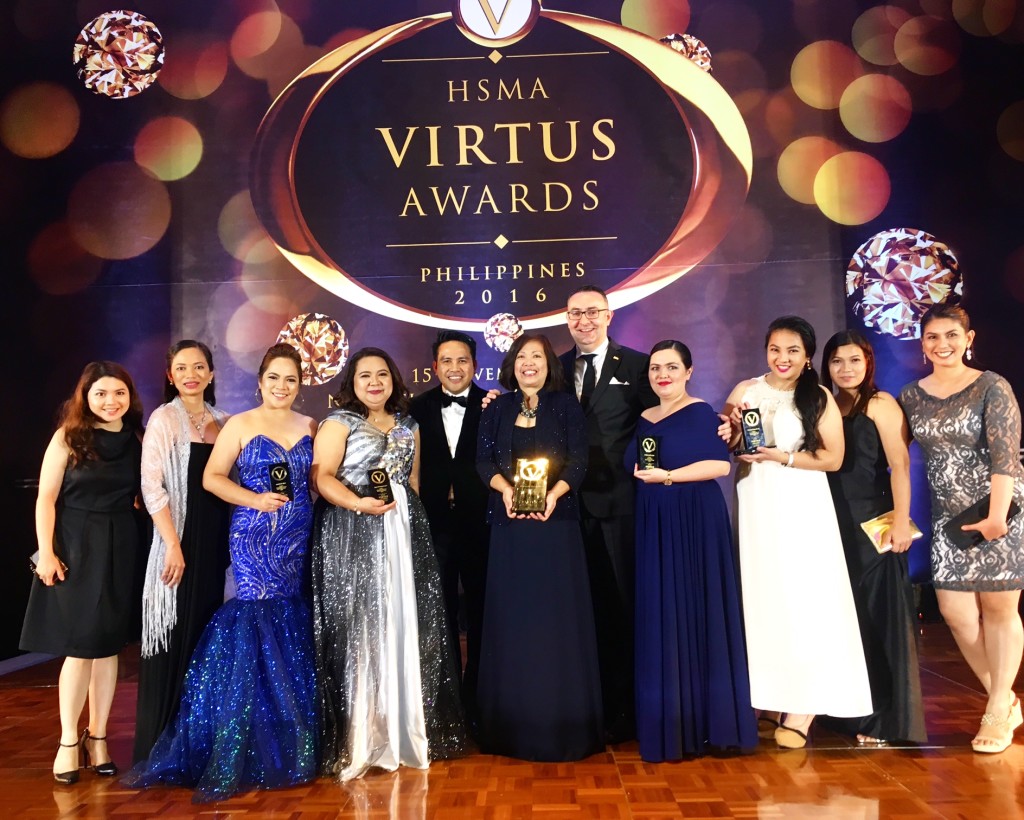 Radisson Blu Cebu Team with General Manager Laurent Boisdron, SM Hotels and Conventions Corp. VP - Marketing Neil Rumbaoa receiving the Virtus Award