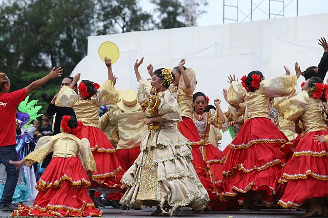 Talisay City Central dancers celebrates after winning the Best in Ritual Showdown prize in this year's Sinulog sa Kabataan sa Lalawigan Elementary division. (CDN PHOTO/JUNJIE MENDOZA) 