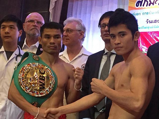 Melvin Jerusalem (right) and Wanheng Menayothin pose after yesterday’s weigh-in for their world title showdown tomorrow in Thailand. At stake in the fight is Menayothin’s WBC minimumweight belt. (CONTRIBUTED PHOTO)