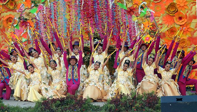 Tribu Sinanduloy Troupe of Tangub City (right and below photos) takes the first place trophy in the Ritual Dance, Sinulog-based category. (CDN PHOTOS/ JUNJIE MENDOZA, LITO TECSON). 