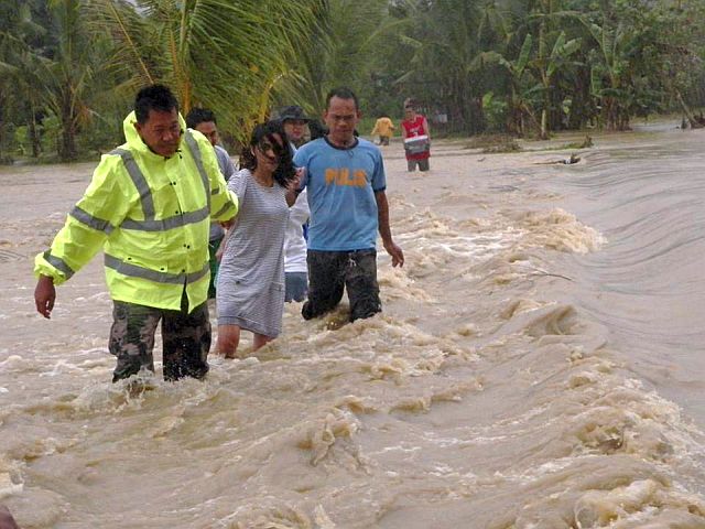 At  least nine villages of Toledo City are submerged in flood waters as Tropical Depression Auring continues to bring moderate to heavy rains since Sunday. (CONTRIBUTED PHOTO). 