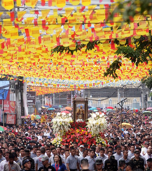 With fervor burning, nearly a million people came together to pay homage to a beloved patron, the Señor Santo Niño, in the fluvial and foot processions that marked the eve of the Feast of the Child Jesus that is being celebrated today, the third Sunday of January. (CDN PHOTO/TONEE DESPOJO)