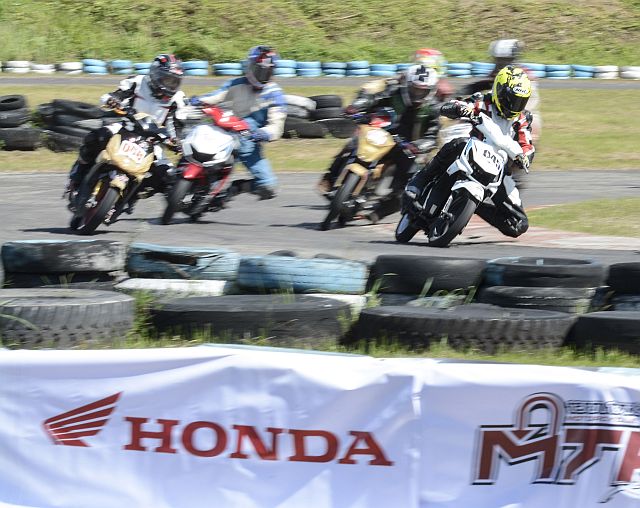 Participants of the second leg of the Honda Dream Cup series race against each other at the Kartzone circuit in barangay Mabolo, Cebu City.  (CDN PHOTO/CHRISTIAN MANINGO) 