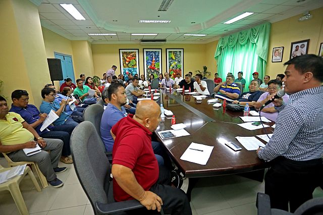 Lawyer Ramil Abing (right), executive director of the  Cebu Provincial Sports Commission, presides over an organizational meeting for the Cebu Province Basketball Cup yesterday at the Legislative Building of the Cebu Provincial Capitol. (CDN PHOTO/LITO TECSON)
