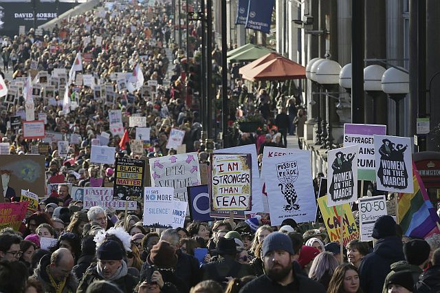 Demonstrators take part in the Women’s March on London, following the Inauguration of U.S. President Donald Trump, in London, Saturday Jan. 21, 2016.  (AP PHOTO)