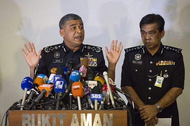 Malaysia's Police Inspector-General Khalid Abu Bakar (left) speaks as Selangor Police Chief Abdul Samah Mat listens during a press conference at the Bukit Aman national police headquarters in Kuala Lumpur, Malaysia, Wednesday. (AP)
