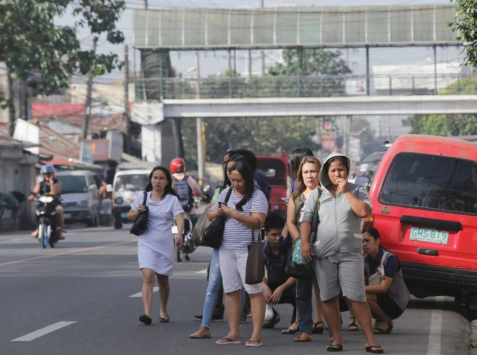 As of 8:30 a.m., more passengers wait for passenger jeepneys along the road in Barangay Bulacao, Cebu City as transport groups hold nationwide transport strike. (CDN PHOTO/JUNJIE MENDOZA)