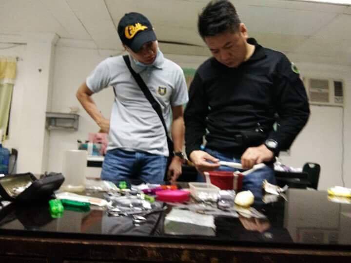 PDEA-7 director Yogi Filemon Ruiz checks seized items during the Greyhound Operation conducted on Tuesday dawn at CPDRC. (CONTRIBUTED PHOTO/CCPO MERLIE DACUNOS)