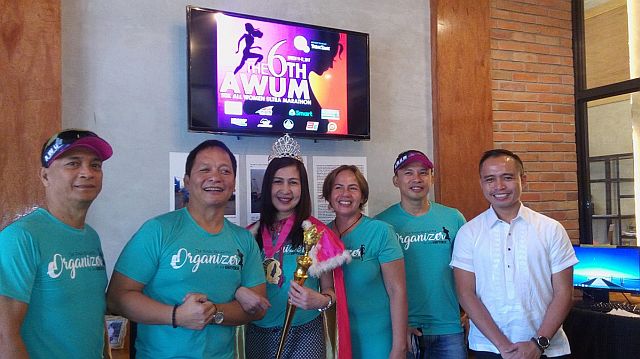 All-Women's Ultra Marathon organizers (from left) Lidoy Mendoza, Councilor Joel Garganera, Dr. Humility Igaña, Lulu Valiente and Tony Galon with Filinvest Life Malls Marketing Manager George Galles during a press conference for the 50-kilometer race slated  March 11-12. The presser was held Monday morning in the office of Garganera at the Cebu City Hall. (CDN PHOTO/GLENDALE G. ROSAL)
