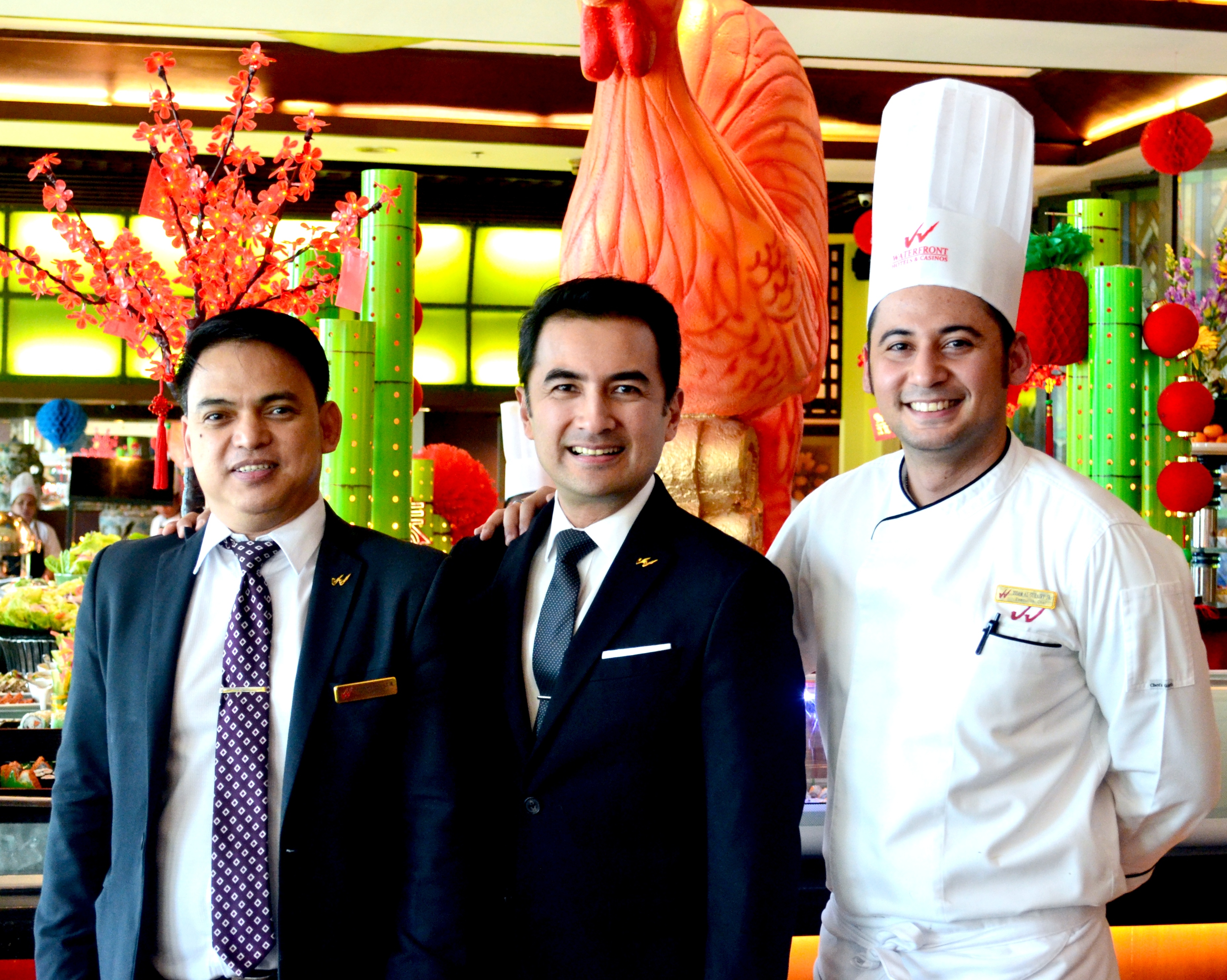 (From left):  Nestor  Lacanlale Jr., Food  & Beverage  Manager; Benhur  Caballes,  Hotel Manager;  Issam  Al-Suhairy,  Executive Chef