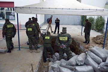 Greek bomb disposal experts at the site of World-War II bomb on February 12, 2017 AP PHOTO 