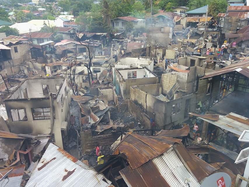 150 houses were burned down by fire that hit barangays Tisa and Labangon in Cebu City. (CDN PHOTO/JUNJIE MENDOZA)