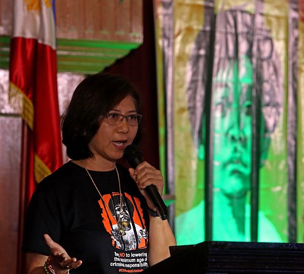Rep. Jocelyn Sy-Limkaichong (Negros, 1st district) discusses the proposed House bill which lowers the minimum age of criminal liability from 15 to 9 during a forum at the Capitol. She was one of the speakers of the forum. CDN PHOTO/LITO TECSON)