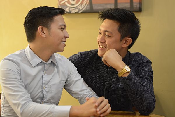 Christian Quilban Moscoso (left) and Brick Mc Johnson Estella (right) have been going out for almost a year, openly holding hands  and calling each other ‘love’ in public. They believe that declaring their  same sex relationship out in the open eliminates more ‘complications’.       