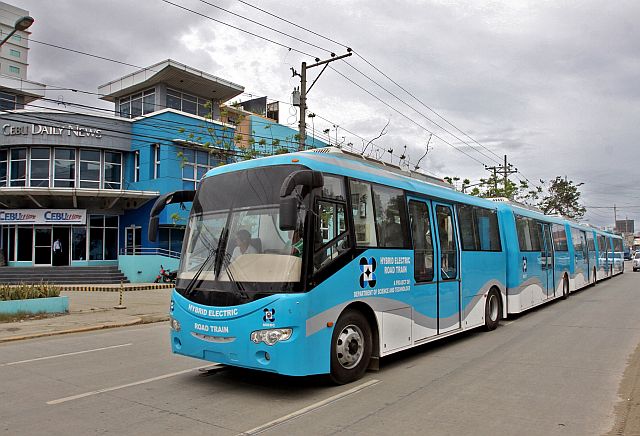 The hybrid electric road train or E-Train goes on a road test at the  North Reclamation Area , Wednesday,  in preparation for its  operations set to begin  on February 15 or   once traffic officials in Cebu City and the Department of Science and Technology (DOST)  are able to figure out the trains’ routes. (CDN PHOTO/JUNJIE MENDOZA)