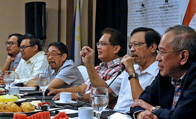 Director Exequiel Sarcauga of the Department of Labor and Employment in Central Visayas (fifth from left) gives an update on the government’s “end of contract” campaign in the region during the 888 news forum at the Marco Polo plaza. Labor groups and business group leaders also attended the forum. (CDN PHOTO/JUNJIE MENDOZA)