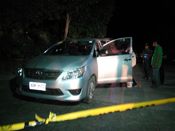 Police inspect the vehicle of lawyer Mia Manuelita Cumba Masacariñas-Green, who was killed in an ambush in Tagbilaran City, Bohol on Wednesday afternoon. /Inquirer Visayas