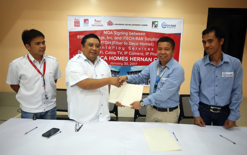 MOA Signing between 8990 Holdings Inc. and ITECH-RAR Solutions, Inc. for the installation of FTDH (Fiber to Deca Homes) PentaPlay Services at Urban Deca Homes Hernan Cortes. (Left to right) Engr. James Estabella (AGM-Engineering & Construction), Ariel Jose Mercado (Assistant General Manager), Engr. Andres Ralota Jr. (8990 FTDH - COO) and Engr. Emmanuel Lomboy (8990 FTDH - Project Manager) [CDN Photo | Lito Tecson]