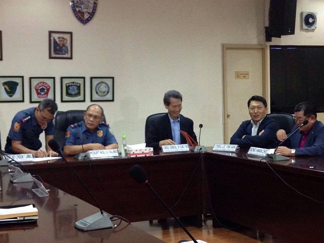 Police Regional Office in Central Visayas director Chief Supt. Noli Taliño, Consulate of South Korea in Cebu Consul General Sung Yong Oh, Consul Yong Sang Lee and Cebu Korean Association president Bong Hwan Cho have a light talk minutes before the press conference on Wednesday, Feb. 8, 2017, to clarify reports on the presence of a Korean mafia in Cebu earlier revealed by President Rodrigo Duterte. (CDN PHOTO/NESTLE SEMILLA)
