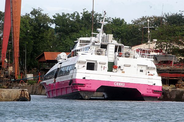 The damaged MV St. Braquiel of 2Go Shipping is docked on Sunday, Feb. 19, 2017, at the Mactan Shipyard after it collided with San Miguel Corp. Barge No. 8 along the Mactan Channel past 10 p.m. on Saturday.  