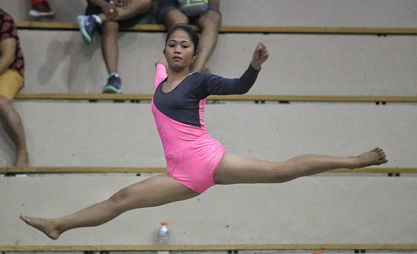 Alixa Balila of Cebu Province does an air split during her floor exercise routine in the ongoing Cviraa meet.  