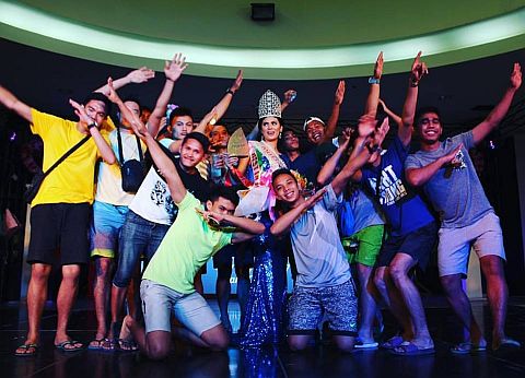 Athletes from USJ-R surround Gazini Christiana Ganados, who won the Mutya ng Prisaa beauty pageant in Bohol.  contributed