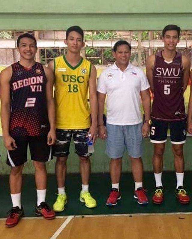 The three Cebuano spikers named to the 20-man National Pool for volleyball pose with national coach Sammy Acaylar (3rd from left). They are Alden Dave Cabaron, John Kenneth Sarcena and John Eduard Carascal