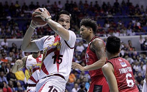 Caption: June Mar Fajardo (15) of San Miguel Beer posts up against Barangay Ginebra's Joe Devance in Game 4 of the PBA Philippine Cup best-of-seven finals series Friday night at the Araneta Coliseum. (PHOTO GRABBED FROM PBA.PH) 