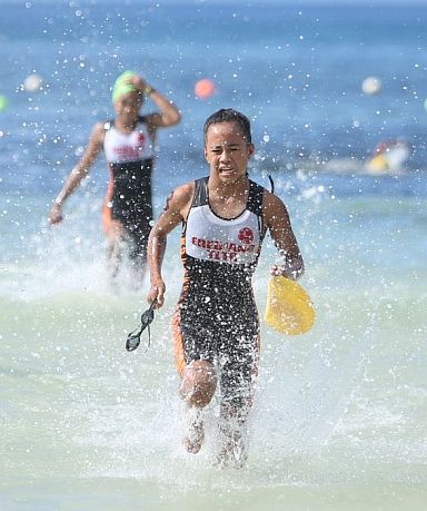 Moira Frances Erediano completes the swim portion en route to topping the 13-15 years old mini sprint division of the National Age Group Triathlon 2017-Cebu Leg in Santiago Bay, Camotes Island, Cebu.