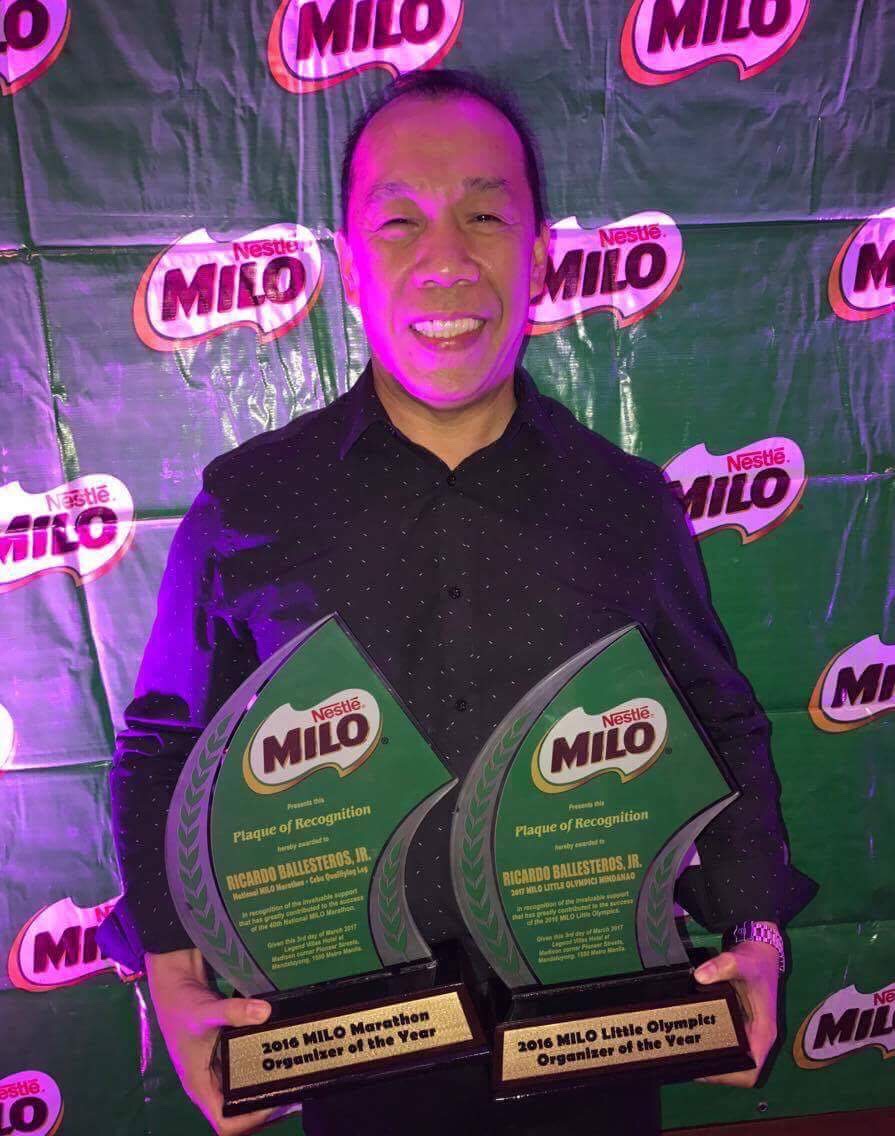 Ricky Ballesteros shows off the two plaques he received during the Milo Annual Recognition Night on Friday night at the Legend Villa Hotel in Mandaluyong City. (CONTRIBUTED PHOTO)