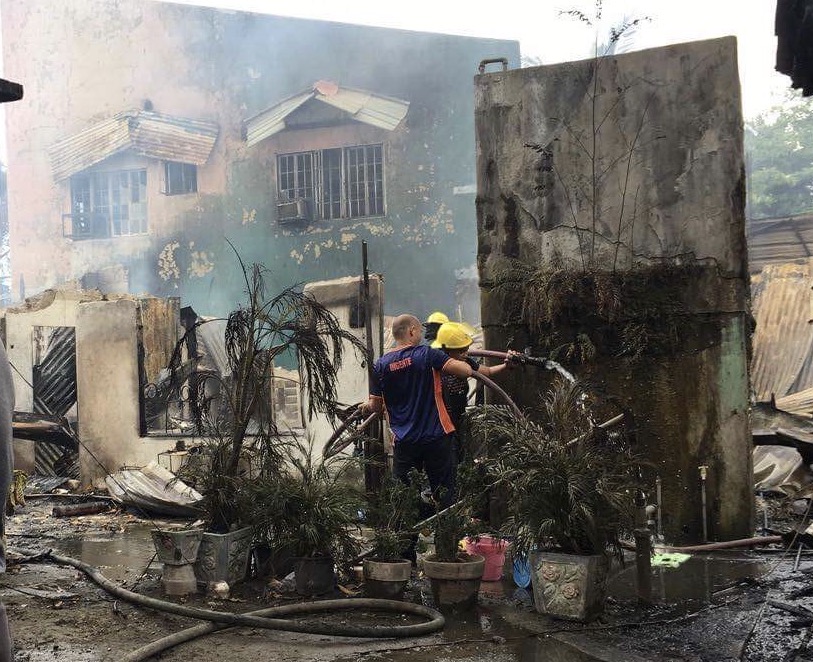 Ten houses were razed while three others were damaged by the morning fire that hit a compound in Barangay Punta Princesa, Cebu City on Wednesday. (CDN PHOTO/IZOBELLE T. PULGO)