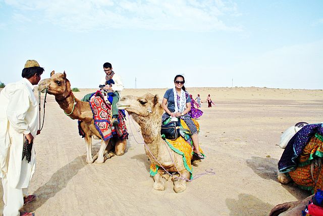 The writer gets ready  for a camel ride