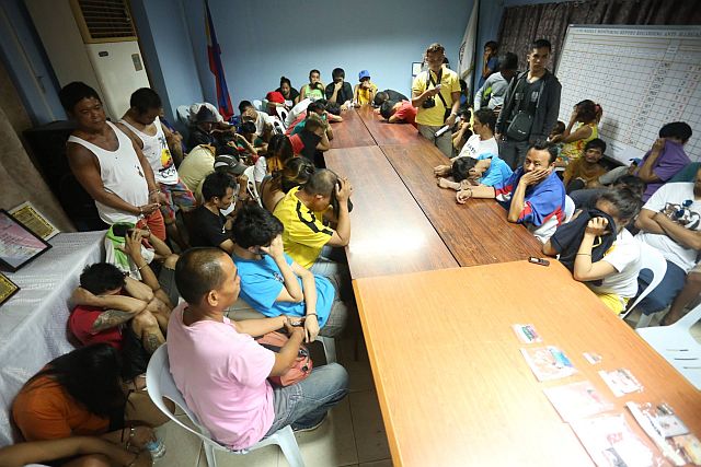At least 106 persons were rounded up by Cebu City police during their Oplan Pokemon operation on Wednesday afternoon. (CDN PHOTO/LITO TECSON)
