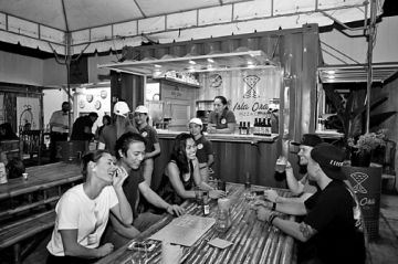 Customers enjoy the food, the beer, and each other’s company at Isla Ora. 