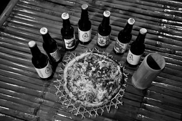 One of the store’s pizzas paired with local craft beers.