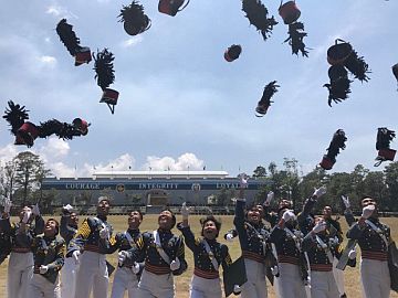 Members of the Philippine Military Academy (PMA) Salaknib Class throw their shaku, signifying the accomplishment of their cadetship in the country’s premiere military school. Cadet First Class Rovi Mairel Martinez of Cabanatuan City ranked first among the 167 graduates.  /INQUIRER.net