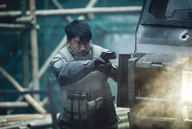 In this image released by Paramount Pictures, Chin Han appears in a scene from, "Ghost in the Shell." (Jasin Boland/Paramount Pictures and DreamWorks Pictures via AP)