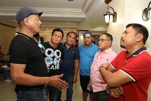 Busay Barangay Captain Amilo Lopez (left) refuses to have his  drug test taken by the Cebu City Office for Substance Abuse Prevention (Cosap) because of his “trauma” over last year’s controversial Cosap drug test results. He appeals before Councilor Dave Tumulak and Association of Barangay Councils (ABC) president Philip Zafra to spare him from the Cosap tests yesterday. (CDN PHOTO/TONEE DESPOJO)