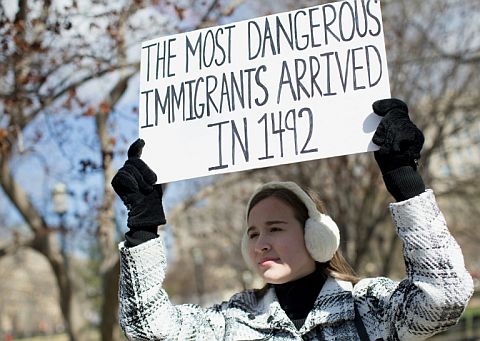  A demonstrator holds a sign near the White House to protest President Donald Trump’s travel ban on six Muslim countries  AFP PHOTO